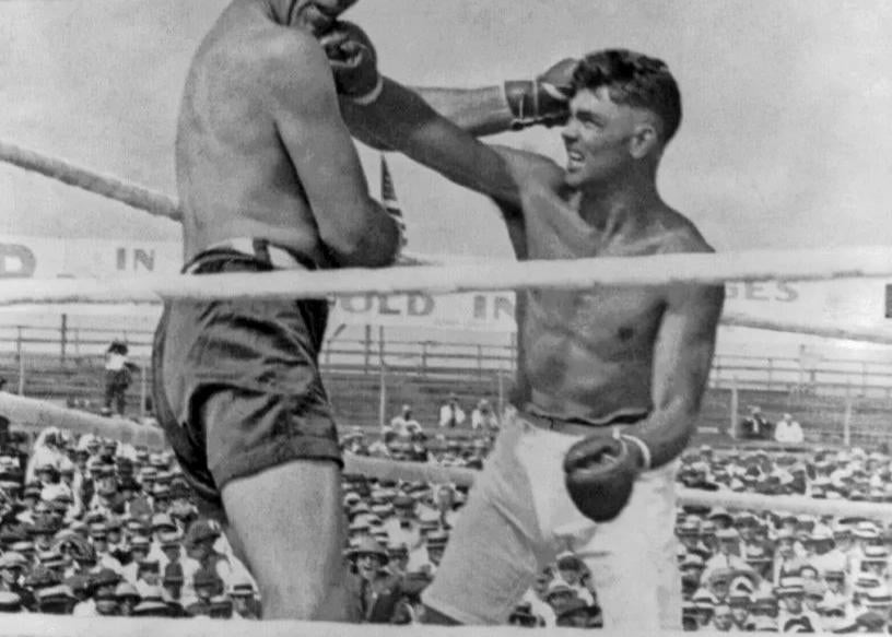 Jack Dempsey and Jess Willard during their boxing world heavyweight title fight at Toledo, Ohio, 4th July 1919.